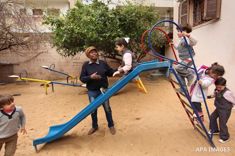 Salwa Sorour plays with children inside a kindergarten in Gaza City, on March 16, 2016. 40-year-old Salwa Sorour is the only woman who drives a kindergarten mini-van to transport children in the Gaza Strip. The Palestini...