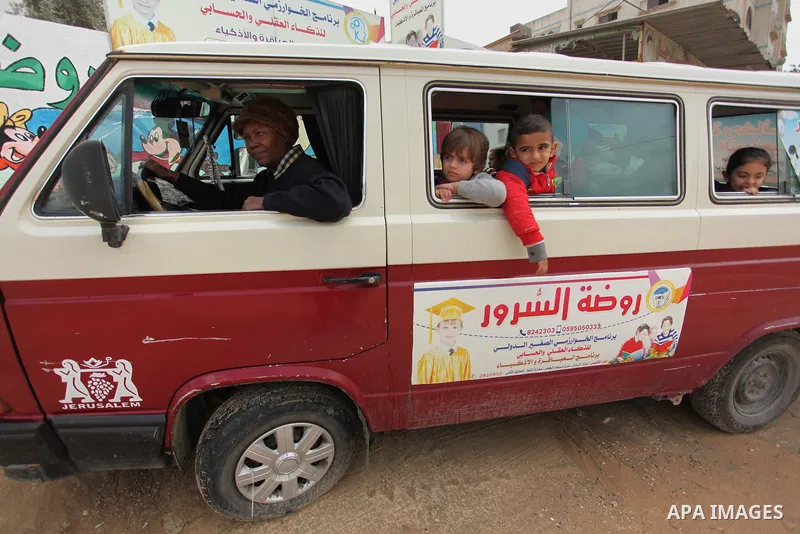 Salwa Sorour drives her mini-van in Gaza City on March 16, 2016. 40-year-old Salwa Sorour is the only woman who drives a kindergarten mini-van to transport children in the Gaza Strip. The Palestinian Central Bureau of St...