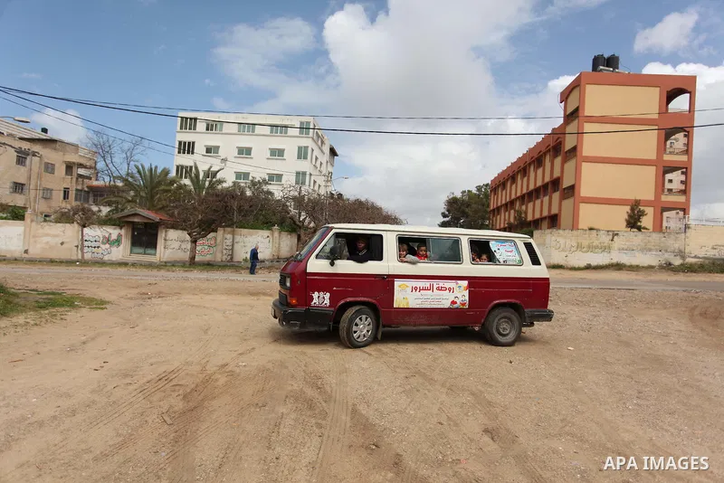 Salwa Sorour drives her mini-van in Gaza City on March 16, 2016. 40-year-old Salwa Sorour is the only woman who drives a kindergarten mini-van to transport children in the Gaza Strip. The Palestinian Central Bureau of St...