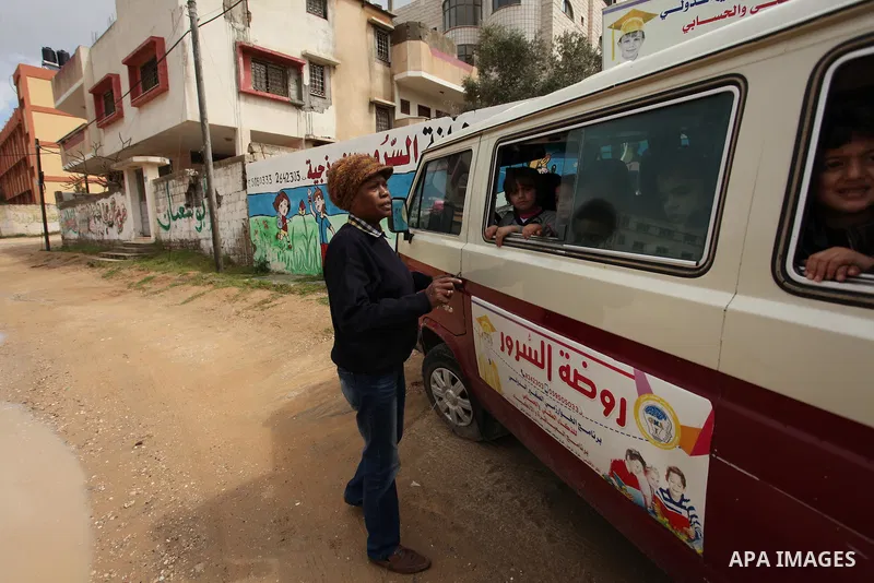 Salwa Sorour drives her mini-van in Gaza City on March 16, 2016. 40-year-old Salwa Sorour is the only woman who drives a kindergarten mini-van to transport children in the Gaza Strip. The Palestinian Central Bureau of St...