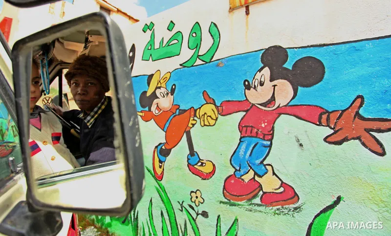 Salwa Sorour drives her mini-van in Gaza City on March 16, 2016. 40-year-old Salwa Sorour is the only woman who drives a kindergarten mini-van to transport children in the Gaza Strip. The Palestinian Central Bureau of St...