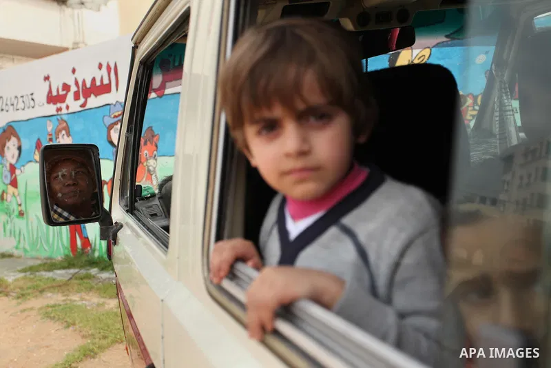 Salwa Sorour drives her mini-van in Gaza City on March 16, 2016. 40-year-old Salwa Sorour is the only woman who drives a kindergarten mini-van to transport children in the Gaza Strip. The Palestinian Central Bureau of St...