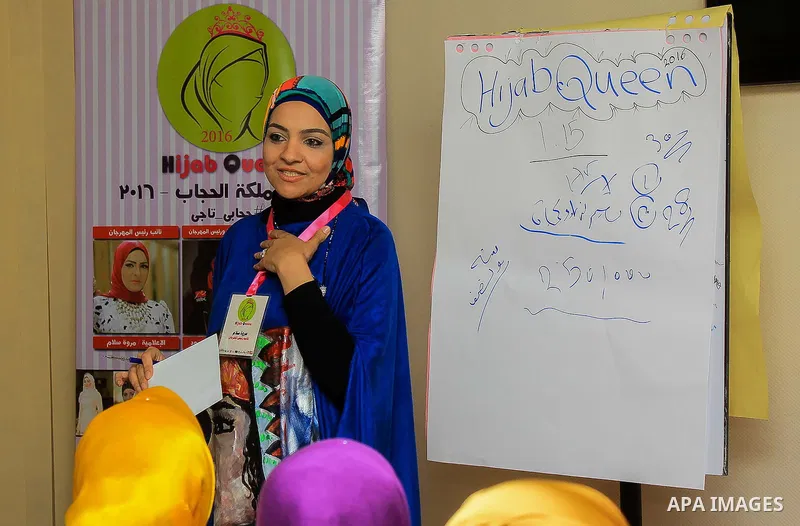 Egyptian girls take part in a competition hijab queen, in Cairo, on March 19, 2016. Photo by Amr Sayed