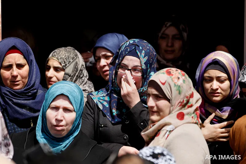 Relatives mourn during the funeral of 19-year old Mahmoud Abu Fanoneh in the West Bank city of Hebron, 19 March 2016. Mahmoud who according to the Israeli Army attempted to kill an Israeli soldier at a main road junction...