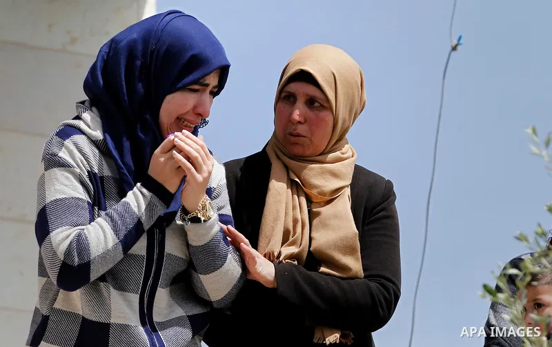 Relatives mourn during the funeral of 19-year old Mahmoud Abu Fanoneh in the West Bank city of Hebron, 19 March 2016. Mahmoud who according to the Israeli Army attempted to kill an Israeli soldier at a main road junction...