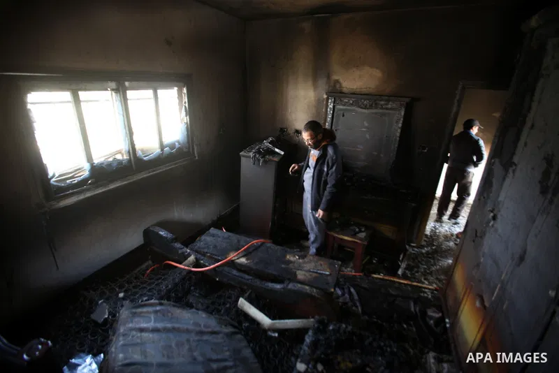 Palestinians inspect the damage to the torched house of Ibrahim Dawabsheh, the main witness in the July arson attack that killed a Palestinian family, in the Israeli occupied West Bank village of Duma near Nablus , after...