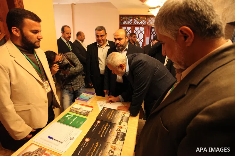 Senior Hamas leader Ismail Haniya attends a ceremony Book sinning for Hamas founder the martyr, Ahmed Yaseen in 12th anniversary for his assassination in Gaza City on March 22, 2016. Photo by Ashraf Amra