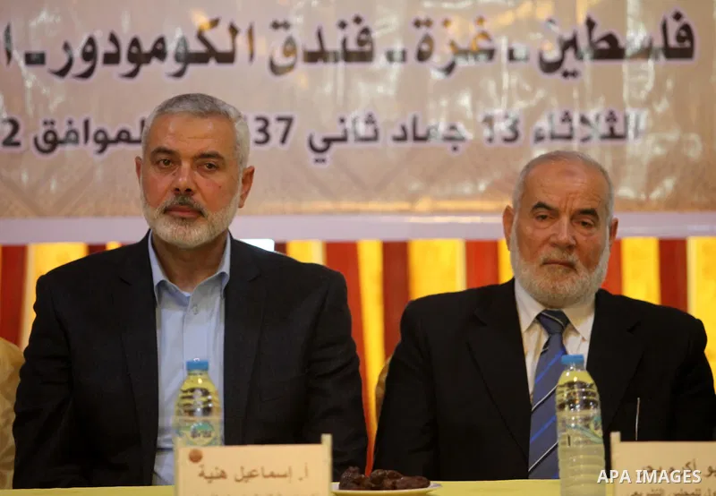 Senior Hamas leader Ismail Haniya attends a ceremony Book sinning for Hamas founder the martyr, Ahmed Yaseen in 12th anniversary for his assassination in Gaza City on March 22, 2016. Photo by Ashraf Amra