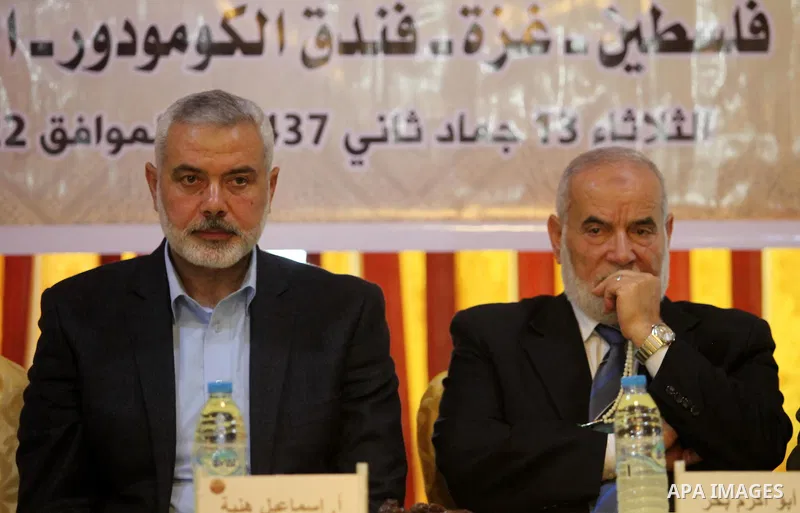 Senior Hamas leader Ismail Haniya attends a ceremony Book sinning for Hamas founder the martyr, Ahmed Yaseen in 12th anniversary for his assassination in Gaza City on March 22, 2016. Photo by Ashraf Amra