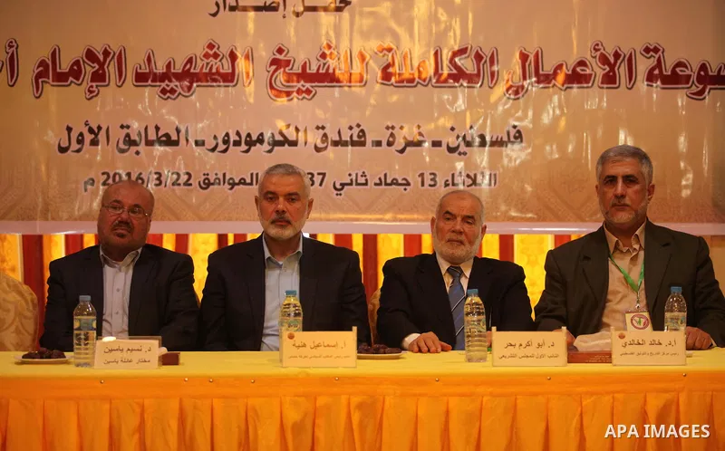 Senior Hamas leader Ismail Haniya attends a ceremony Book sinning for Hamas founder the martyr, Ahmed Yaseen in 12th anniversary for his assassination in Gaza City on March 22, 2016. Photo by Ashraf Amra