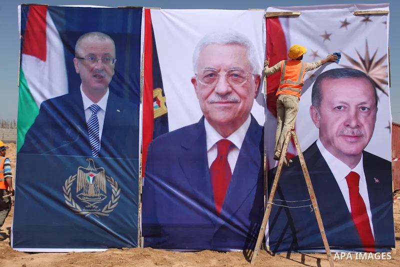 Palestinian construction labourers work on a Turkish funded project to build 320 housing units for families who lost their homes during the 50-day war between Israel and Hamas-led militants in the summer of 2014, east of...