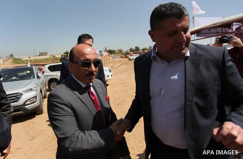 Palestinian housing minister Mufeed al-Hasayna, and representative of the Turkish Cooperation and Coordination Agency "TİKA", Bulent Korkmaz attend a Turkish funded project to build 320 housing units for families who los...