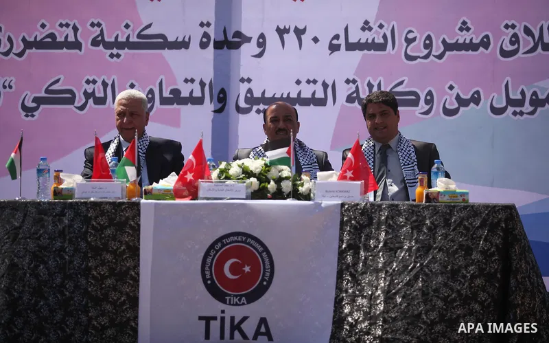 Palestinian housing minister Mufeed al-Hasayna, and representative of the Turkish Cooperation and Coordination Agency "TİKA", Bulent Korkmaz attend a Turkish funded project to build 320 housing units for families who los...