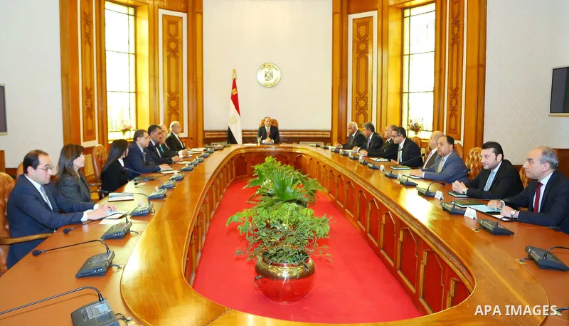 Egyptian President Abdel Fattah al-Sisi meets with members of the newly appointed cabinet, in the capital Cairo on March 23, 2016. Sisi swore in 10 new ministers in a cabinet reshuffle, as Egypt struggles to revive an ec...