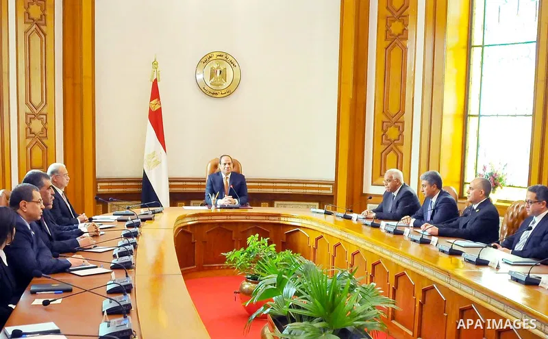 Egyptian President Abdel Fattah al-Sisi meets with members of the newly appointed cabinet, in the capital Cairo on March 23, 2016. Sisi swore in 10 new ministers in a cabinet reshuffle, as Egypt struggles to revive an ec...