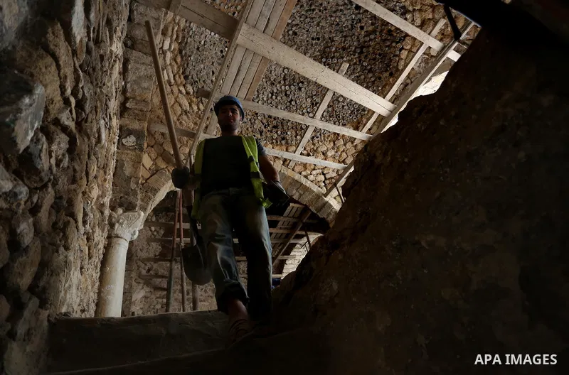 A Palestinian worker renovates the archaeological Maqam Al-Khader, in Deir al-Balah, central Gaza on March 24, 2016. Maqam Al-Kader is one of the monuments of the city of Deir al-Balah, the Ministry of Tourism and Antiqu...