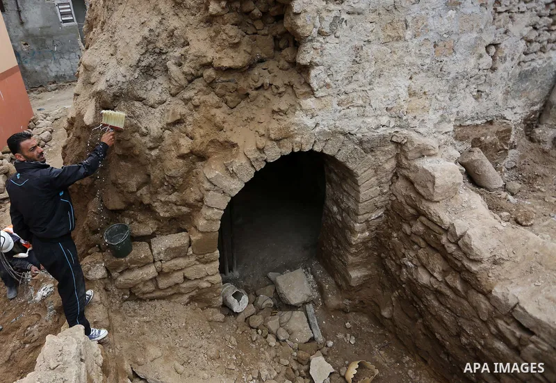 A Palestinian worker renovates the archaeological Maqam Al-Khader, in Deir al-Balah, central Gaza on March 24, 2016. Maqam Al-Kader is one of the monuments of the city of Deir al-Balah, the Ministry of Tourism and Antiqu...
