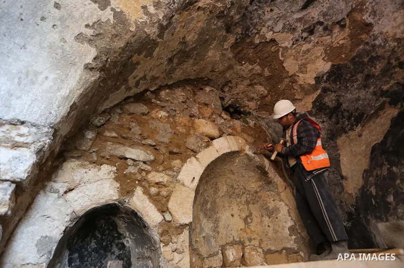 A Palestinian worker renovates the archaeological Maqam Al-Khader, in Deir al-Balah, central Gaza on March 24, 2016. Maqam Al-Kader is one of the monuments of the city of Deir al-Balah, the Ministry of Tourism and Antiqu...