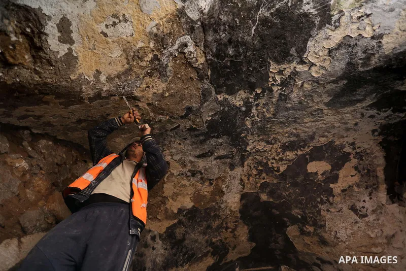 A Palestinian worker renovates the archaeological Maqam Al-Khader, in Deir al-Balah, central Gaza on March 24, 2016. Maqam Al-Kader is one of the monuments of the city of Deir al-Balah, the Ministry of Tourism and Antiqu...