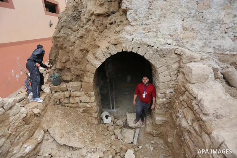Palestinian workers renovate the archaeological Maqam Al-Khader, in Deir al-Balah, central Gaza on March 24, 2016. Maqam Al-Kader is one of the monuments of the city of Deir al-Balah, the Ministry of Tourism and Antiquit...