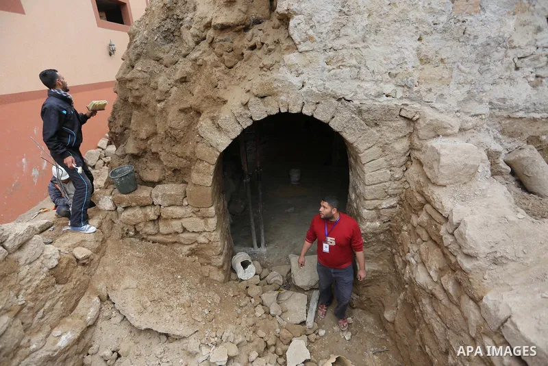 Palestinian workers renovate the archaeological Maqam Al-Khader, in Deir al-Balah, central Gaza on March 24, 2016. Maqam Al-Kader is one of the monuments of the city of Deir al-Balah, the Ministry of Tourism and Antiquit...