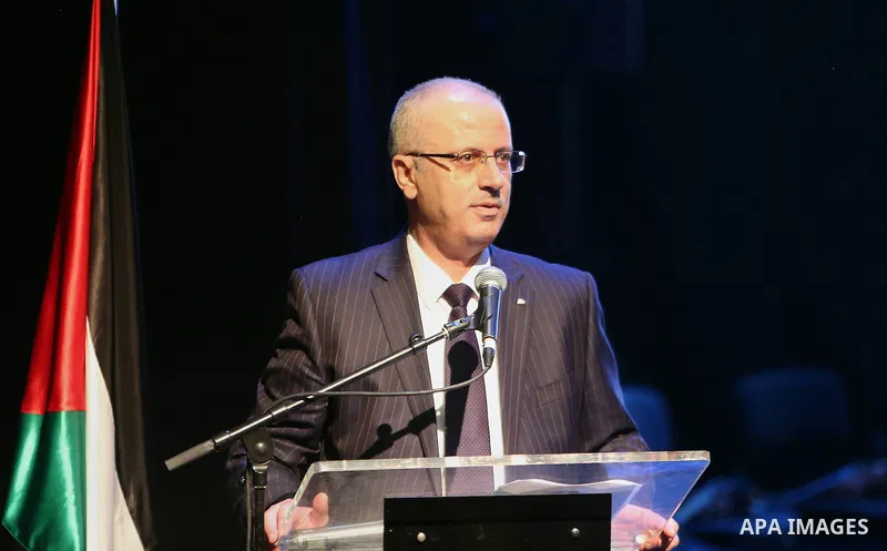 Palestinian Prime Minister, Rami Hamdallah, attends a celebrate of World Water Day, in the West Bank city Ramallah, on March 24, 2016. Photo by Prime Minister Office