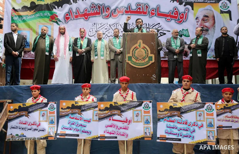 Mushir Al Masri, a Hamas MP and media spokesman speaks during a rally to mark the 12th anniversary of the death of assassinated Hamas spiritual leader Sheikh Ahmed Yassine and show solidarity with Palestinians in Jerusal...