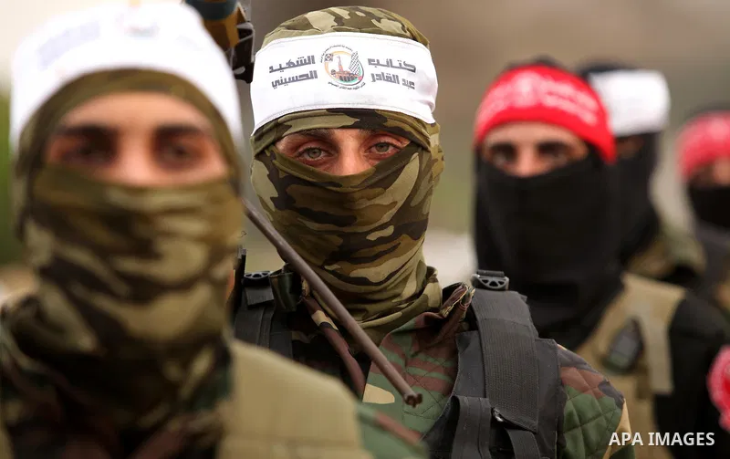 Palestinian militants take part in an anti-Israel joint drill by National Resistance Brigades and Abdel Qader al Husseini Brigades in Khan Younis in the southern Gaza Strip March 25, 2016. Photo by Ashraf Amra