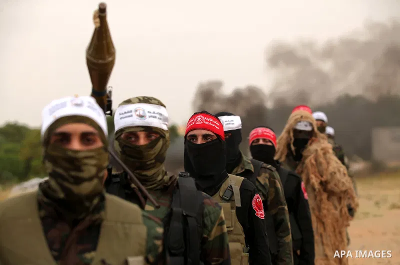 Palestinian militants take part in an anti-Israel joint drill by National Resistance Brigades and Abdel Qader al Husseini Brigades in Khan Younis in the southern Gaza Strip March 25, 2016. Photo by Ashraf Amra