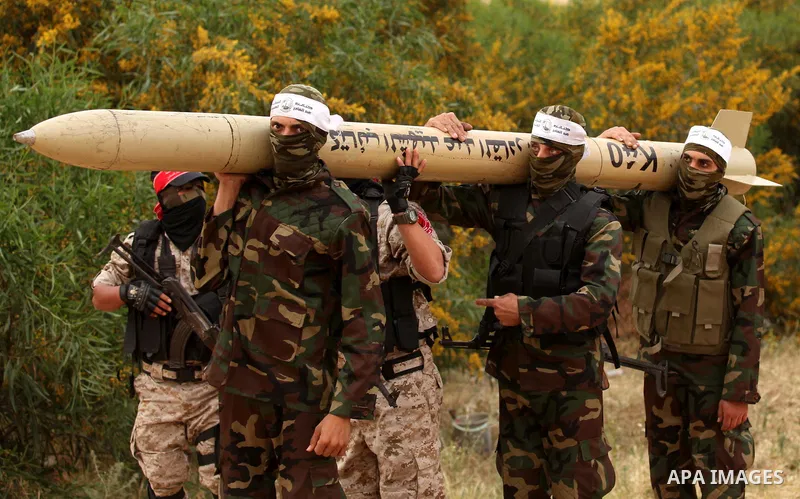 Palestinian militants show a home-made rocket to the media during an anti-Israel joint drill by National Resistance Brigades and Abdel Qader al Husseini Brigades in Khan Younis in the southern Gaza Strip March 25, 2016....