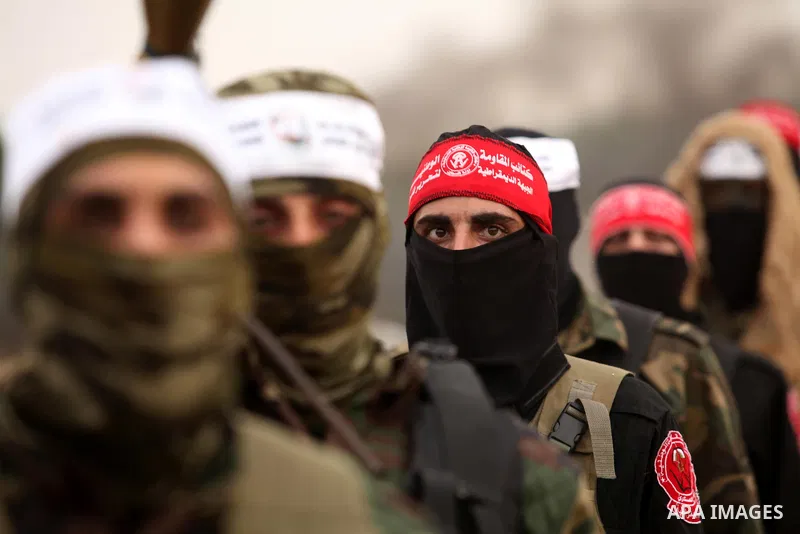 Palestinian militants take part in an anti-Israel joint drill by National Resistance Brigades and Abdel Qader al Husseini Brigades in Khan Younis in the southern Gaza Strip March 25, 2016. Photo by Ashraf Amra