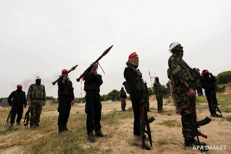 Palestinian militants take part in an anti-Israel joint drill by National Resistance Brigades and Abdel Qader al Husseini Brigades in Khan Younis in the southern Gaza Strip March 25, 2016. Photo by Ashraf Amra