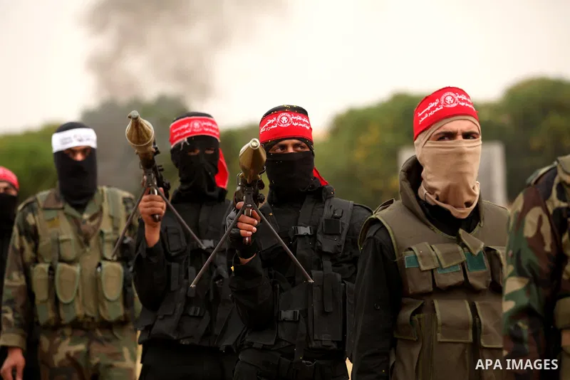 Palestinian militants take part in an anti-Israel joint drill by National Resistance Brigades and Abdel Qader al Husseini Brigades in Khan Younis in the southern Gaza Strip March 25, 2016. Photo by Ashraf Amra