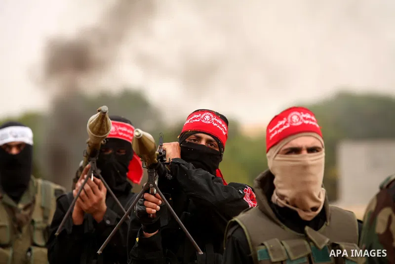 Palestinian militants take part in an anti-Israel joint drill by National Resistance Brigades and Abdel Qader al Husseini Brigades in Khan Younis in the southern Gaza Strip March 25, 2016. Photo by Ashraf Amra