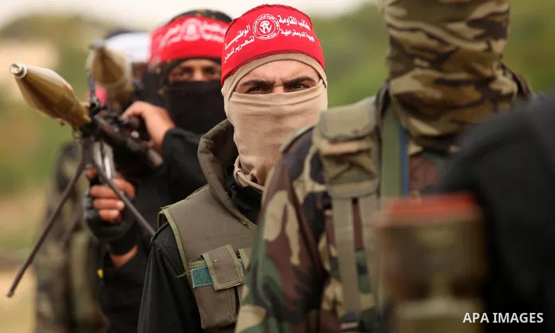 Palestinian militants take part in an anti-Israel joint drill by National Resistance Brigades and Abdel Qader al Husseini Brigades in Khan Younis in the southern Gaza Strip March 25, 2016. Photo by Ashraf Amra