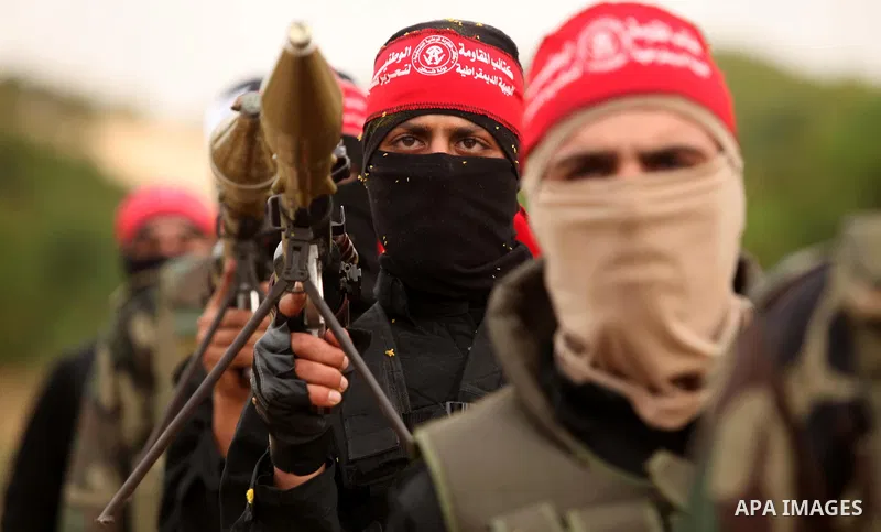 Palestinian militants take part in an anti-Israel joint drill by National Resistance Brigades and Abdel Qader al Husseini Brigades in Khan Younis in the southern Gaza Strip March 25, 2016. Photo by Ashraf Amra
