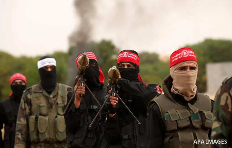 Palestinian militants take part in an anti-Israel joint drill by National Resistance Brigades and Abdel Qader al Husseini Brigades in Khan Younis in the southern Gaza Strip March 25, 2016. Photo by Ashraf Amra