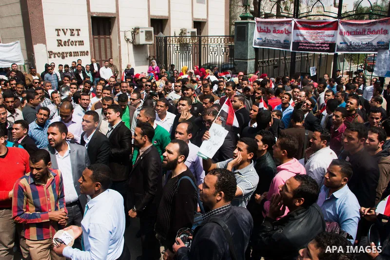 Egyptians Who obtained a master's degree take part in a protest to demand jobs in Cairo, Egypt, on March 27, 2016. Photo by Amr Sayed
