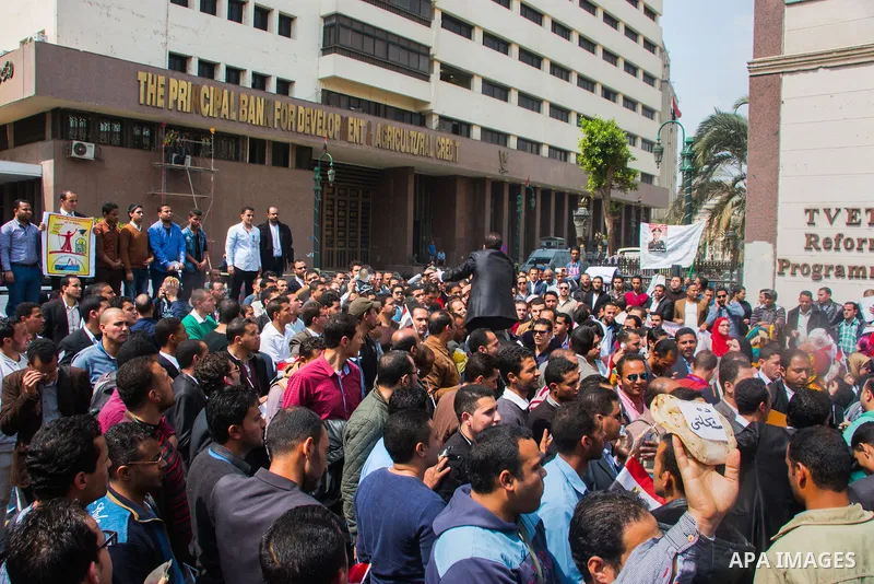 Egyptians Who obtained a master's degree take part in a protest to demand jobs in Cairo, Egypt, on March 27, 2016. Photo by Amr Sayed
