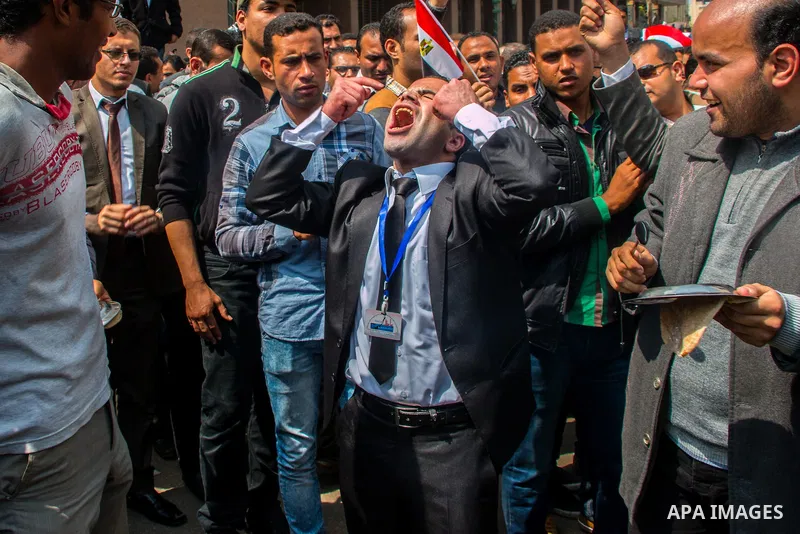 Egyptians Who obtained a master's degree take part in a protest to demand jobs in Cairo, Egypt, on March 27, 2016. Photo by Amr Sayed