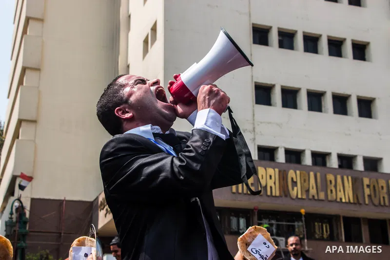 Egyptians Who obtained a master's degree take part in a protest to demand jobs in Cairo, Egypt, on March 27, 2016. Photo by Amr Sayed