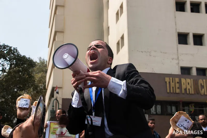 Egyptians Who obtained a master's degree take part in a protest to demand jobs in Cairo, Egypt, on March 27, 2016. Photo by Amr Sayed