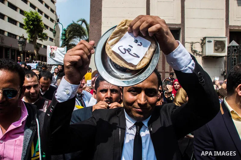 Egyptians Who obtained a master's degree take part in a protest to demand jobs in Cairo, Egypt, on March 27, 2016. Photo by Amr Sayed