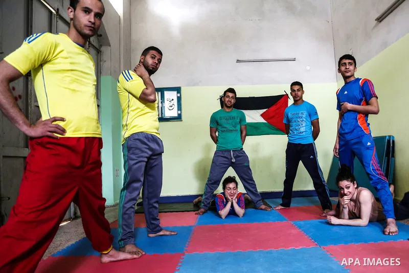 An Italian delegation train Palestinian youths at a Palestinian Circus School in Beit Lahiya in the north of the Gaza strip on March 27, 2016. Photo by Nidal Alwaheidi