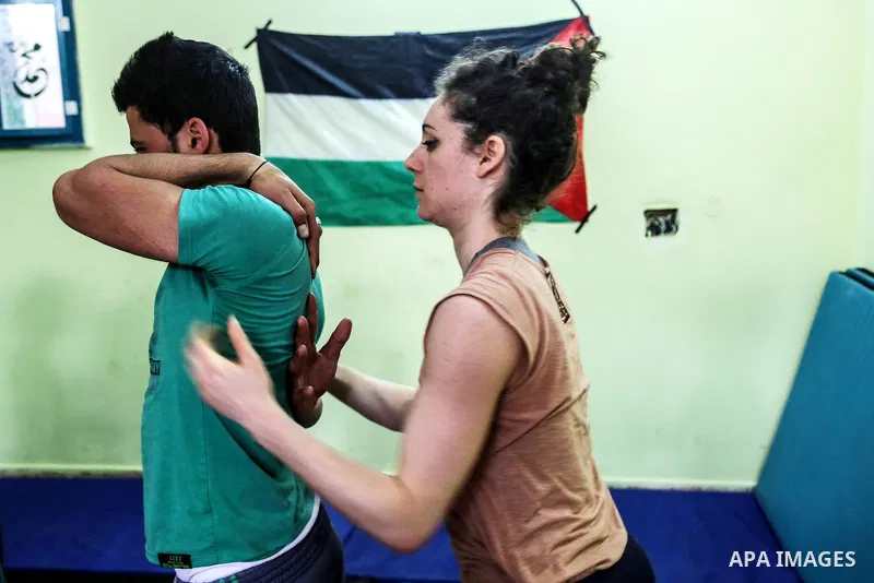 An Italian delegation train Palestinian youths at a Palestinian Circus School in Beit Lahiya in the north of the Gaza strip on March 27, 2016. Photo by Nidal Alwaheidi