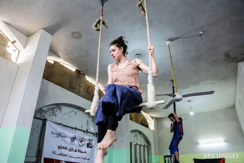 An Italian delegation train Palestinian youths at a Palestinian Circus School in Beit Lahiya in the north of the Gaza strip on March 27, 2016. Photo by Nidal Alwaheidi