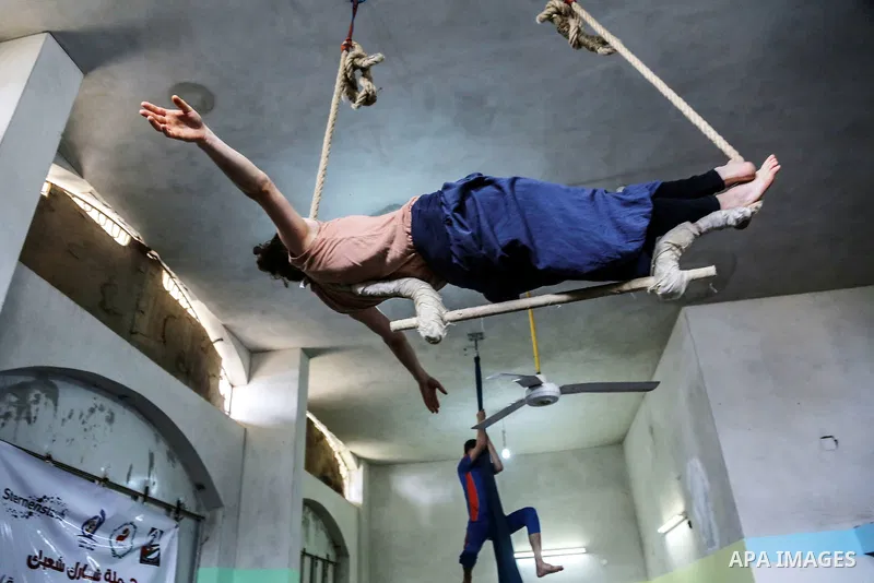 An Italian delegation train Palestinian youths at a Palestinian Circus School in Beit Lahiya in the north of the Gaza strip on March 27, 2016. Photo by Nidal Alwaheidi