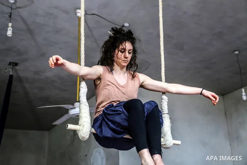 An Italian delegation train Palestinian youths at a Palestinian Circus School in Beit Lahiya in the north of the Gaza strip on March 27, 2016. Photo by Nidal Alwaheidi