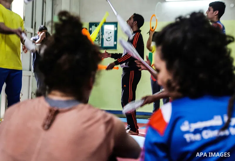 An Italian delegation train Palestinian youths at a Palestinian Circus School in Beit Lahiya in the north of the Gaza strip on March 27, 2016. Photo by Nidal Alwaheidi