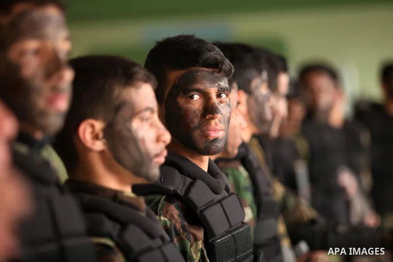 Palestinian students demonstrate their skills during a military-style show at a school in Rafah in the southern Gaza Strip March 28, 2016. Photo by Ashraf Amra